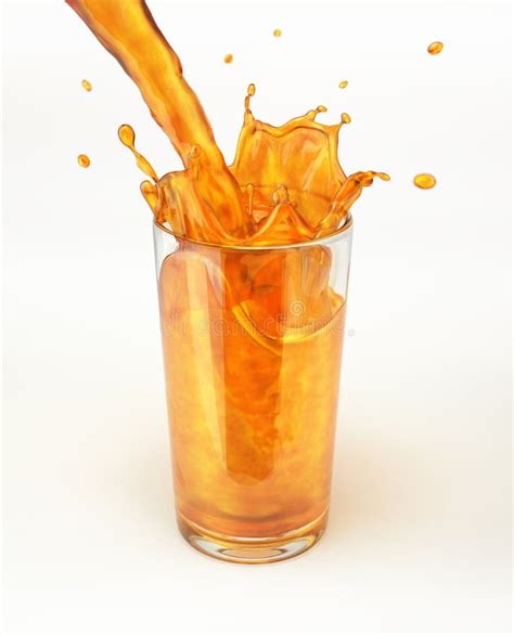 Orange Juice Pouring Into A Glass Forming A Splash Stock Photo