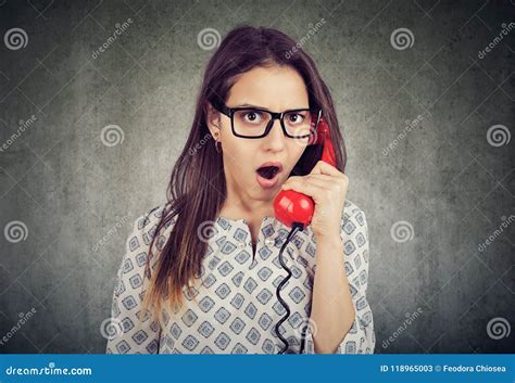 Amazed Shocked Woman Talking On A Telephone Stock Image Image Of Glasses Customer 118965003
