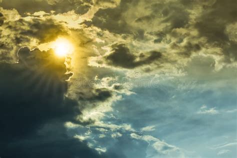 Nature Sun Beam In Dark Clouds And Sky Before Thunderstorm Stock Image