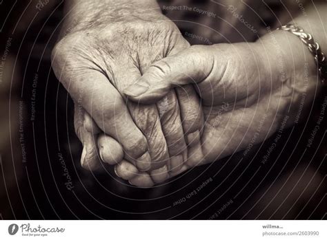 Connectedness Two Seniors Holding Hands A Royalty Free Stock Photo