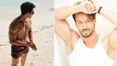 Tiger Shroff Flaunts His Chiselled Abs Goes Shirtless On The Beach