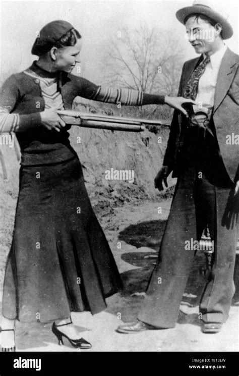 Bonnie And Clyde Bonnie Parker Playfully Aims A Gun At Clyde Barrow