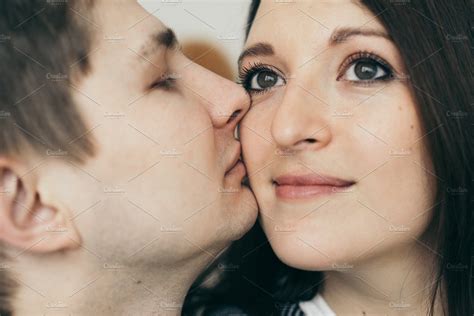 Man Kissing His Wife Featuring Couple Man And Happy People Images ~ Creative Market