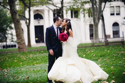 Philly Bride And Groom Pose Outside Wedding Venue