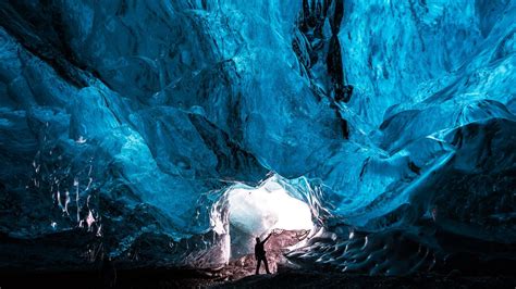 Download 1920x1080 Cave Blue Ice Crystals Man Glowing Wallpapers