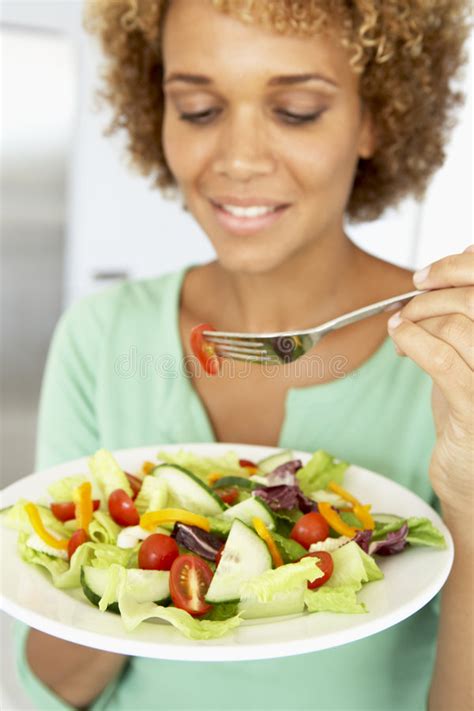 Mid Adult Woman Eating A Healthy Salad Stock Image Image Of Plate