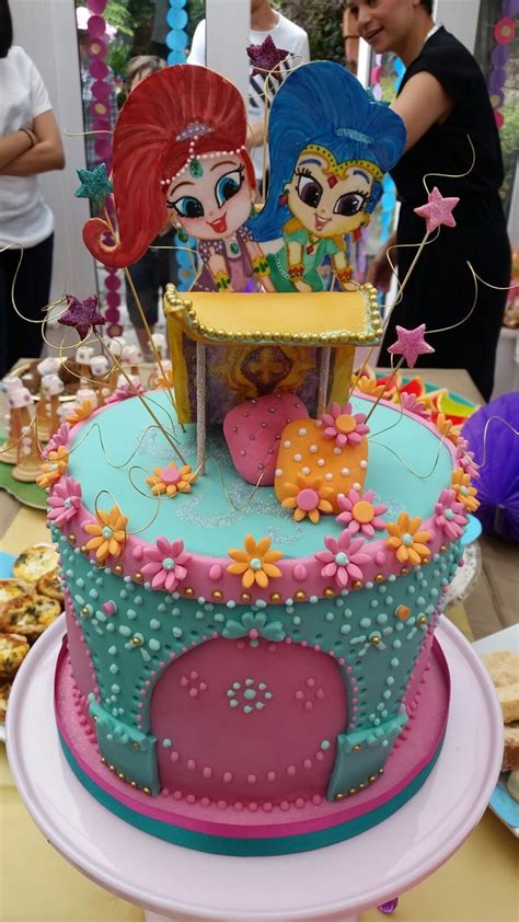 Featuring an edible tala and nahal made from modeling chocolate. Shimmer and Shine cake Cake by Gabi Marx at Fancy that ...