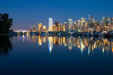 Photo Of City Near Calm Body Of Water Vancouver Hd Wallpaper
