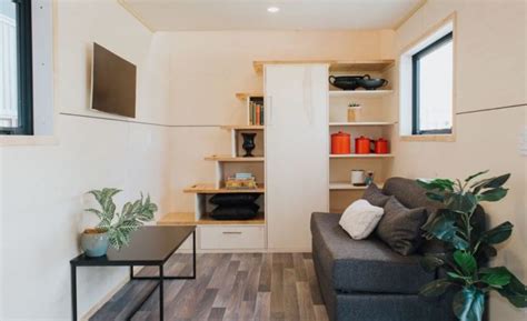 This Tiny House Has Two Staircases With Storage Integrated