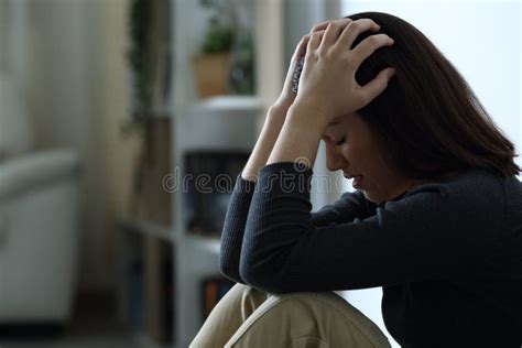 Desperate Sad Woman Complaining Alone In The Dark Stock Image Image