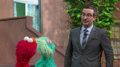 John Oliver Brought On Elmo — Yes Elmo — So Youll Pay Attention To Americas Lead Crisis Vox