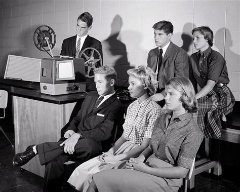 1950s High School Students Watching 16mm Educational Movie In Classroom