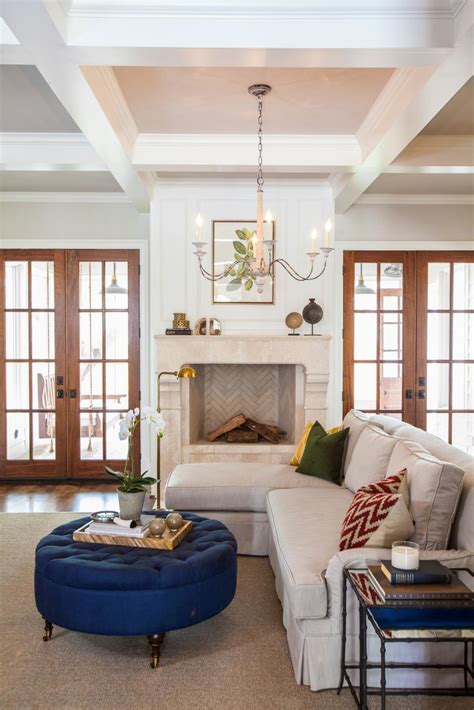 Neutral Transitional Living Room With Blue Ottoman Hgtv