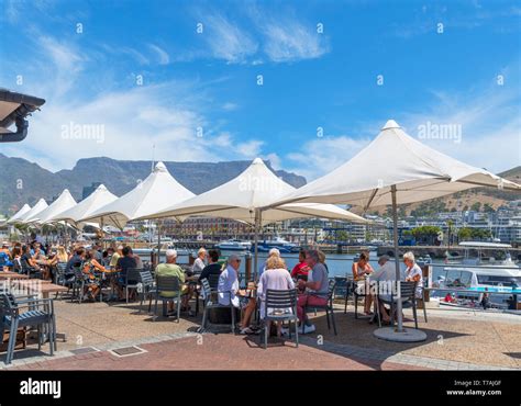 Restaurant At The Vanda Waterfront With Table Mountain In The Background