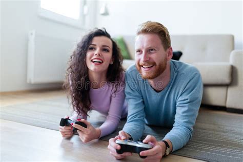 Young Couple Having Fun Playing Video Games Stock Photo Image Of