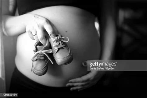 Pregnant With Twins Belly Photos And Premium High Res Pictures Getty Images