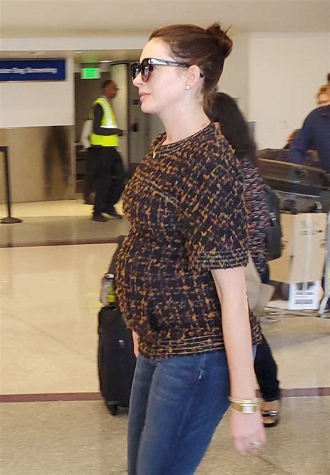 Anne Hathaway Shows Off Baby Bump Just Hours After Announcing Shes