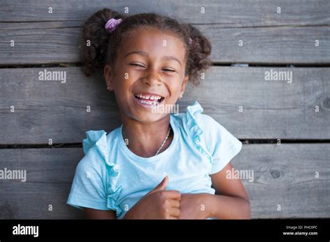 Close Up Portrait Of Pretty Mixed Race African American Little Girl