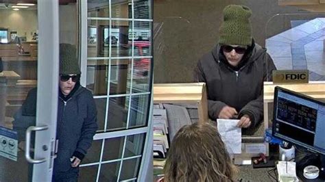 woman accused of robbing bank another with driving getaway car