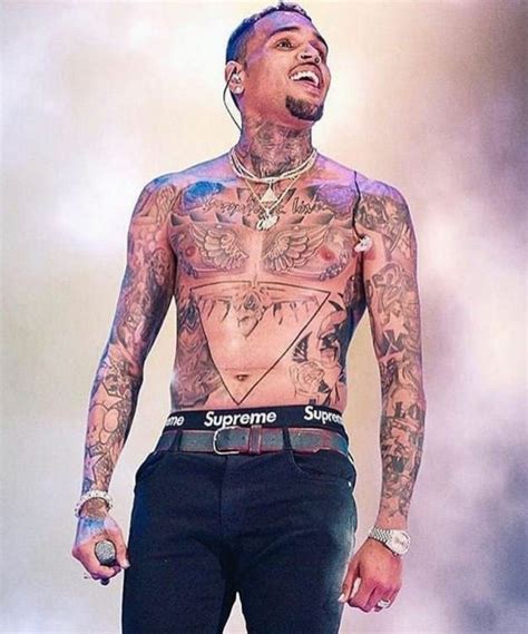 Chris Browns Tattoo Collection On The Head Neck Chest And Both