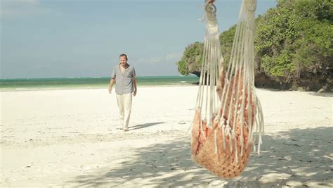 Happy Man Walking On Beautiful Exotic Tropical Beach Stock Footage Video 5473568 Shutterstock