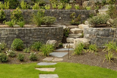 If you think your yard could benefit from a retaining wall the placement of a retaining wall depends on your yard, but it usually comes down to a balance. Big Sky Landscaping - Retaining Walls