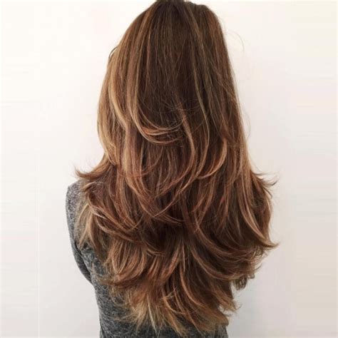 Long thick hair cut with medium layers round brushing is a styling technique for layered haircuts for long hair. 50 Gorgeous Layered Haircuts for Long Hair that You Need ...