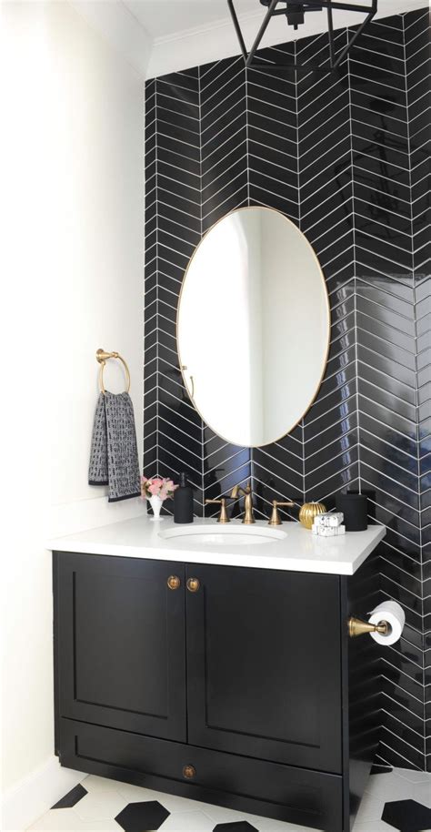 Your bathroom walls might be interesting, but are they efficient? 11 Bathrooms with Black Herringbone Tiles | Black tile ...