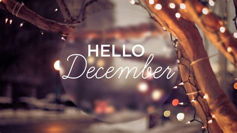 Hello December Letters In Decoration Lights On Tree Branches Background