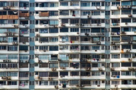 Facade Of A High Rise Apartment House In The Overpopulated City Of