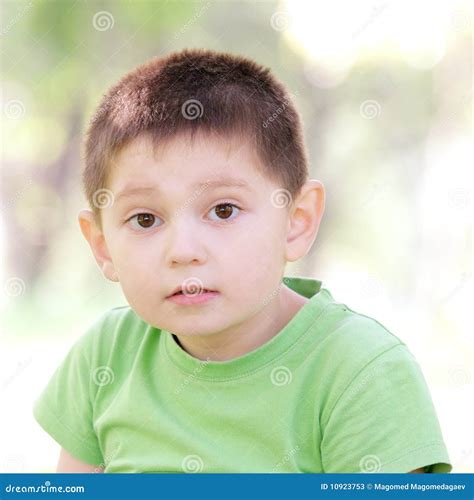 Portrait Of Boy In Green Stock Photos Image 10923753