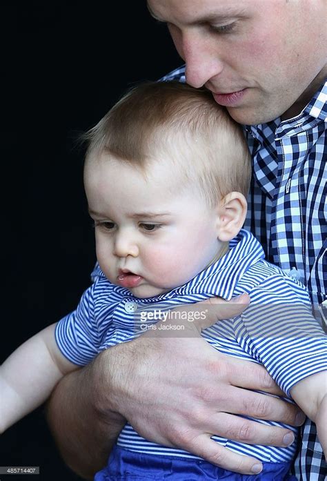 Prince William Duke Of Cambridge Holds Prince George Of Cambridge As They Look At A Bilby