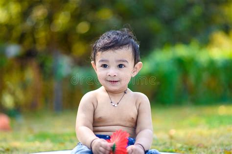 Cute Indian Baby Boy Playing At Garden Stock Image Image Of Closeup