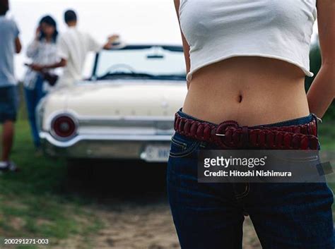 Midriff Jeans Photos And Premium High Res Pictures Getty Images