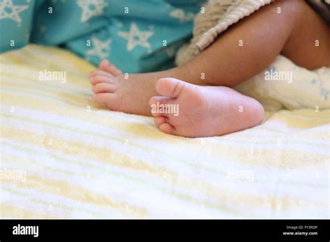 Baby Feet On Age Approximately One Month Stock Photo Alamy