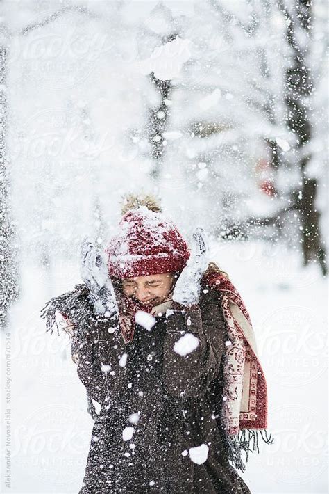 Beautiful Woman Enjoying The Snow In The Park By Stocksy Contributor