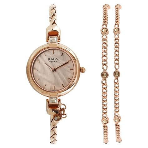 Raga women's analog quartz watch | bangle jewelry style wristwatch. Buy Titan Analog Rose Gold Round Dial Metal Strap Watch ...