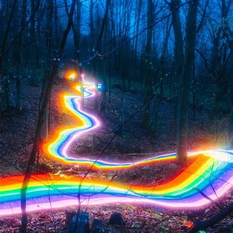 Vibrant Rainbow Roads Illuminate Forests And River Bends Into Magical