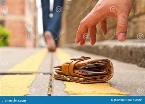 Guy Picking Up A Lost A Lost Purse Wallet Stock Image Image Of Outdoors Full