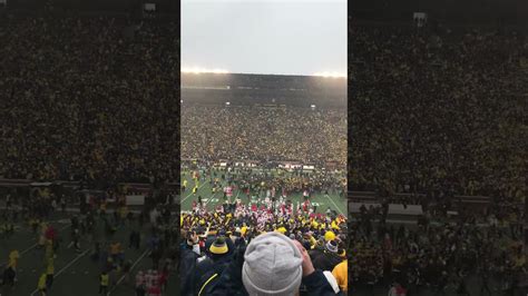 Michigan Wolverine Fans Take The Field After Beating The Ohio State
