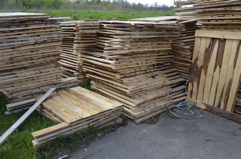 Piled Into A Heap Of Wooden Palletsclose Up Old Wooden Pallets Stock