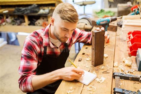 Carpenter Working With Wood Plank At Workshop Stock Image Image Of