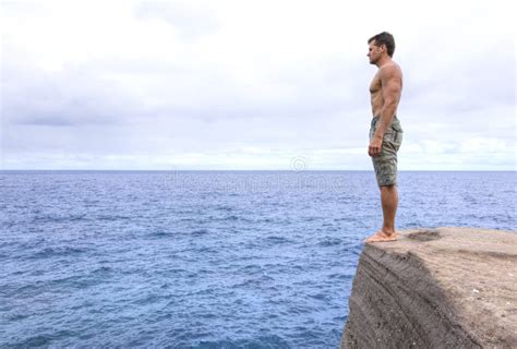 Man Standing On The Edge Stock Photo Image Of Water 85389274