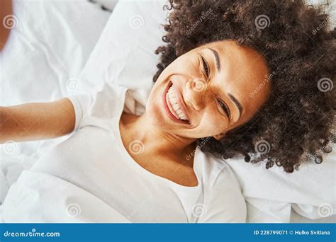 High Spirited Smiling Dark Haired Female Taking A Selfie Stock Image