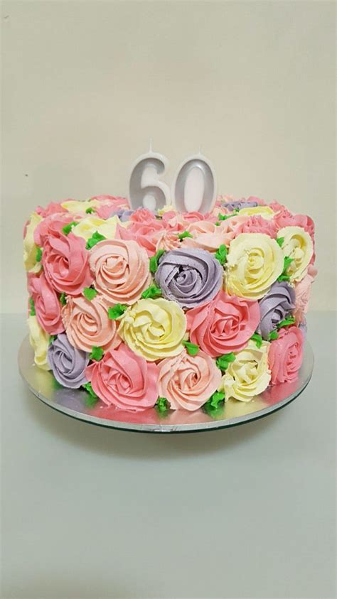 This will be no less than a plaque for your mother's 60th birthday. Buttercream rosette cake. Multicoloured rosettes with ...