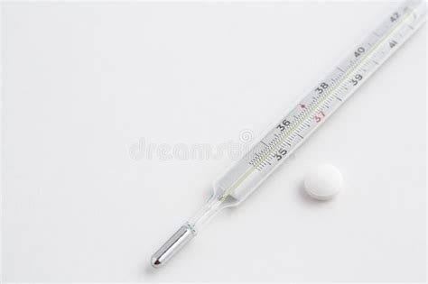 An Old Mercury Thermometer On A White Isolated Background Top View