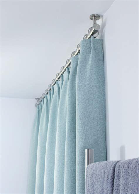 Just because a bar is listed as a shower bar does not mean that it can't be hung elsewhere. Bathroom Update: Ceiling Mounted Shower Curtain Rod ...