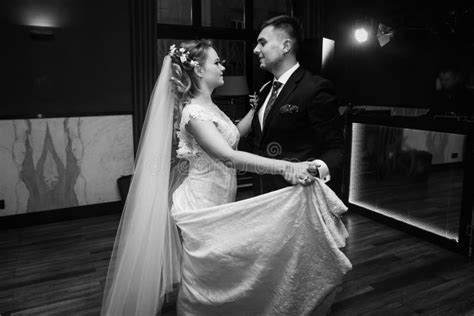 Newlywed Couple First Dance At Ballroom Bride And Groom Dancing Stock