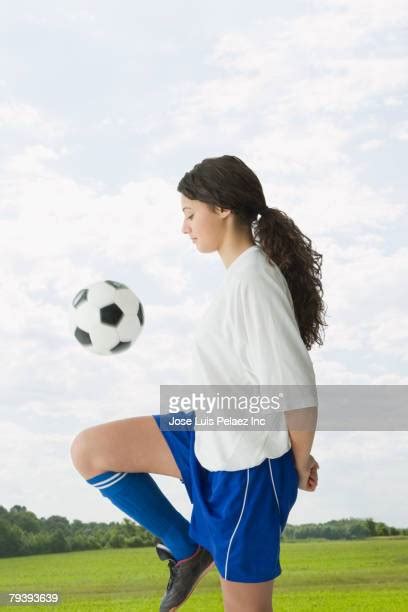 girl juggling soccer ball photos and premium high res pictures getty images