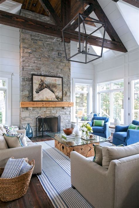 Note that most fireplaces designed for placement in the centre of a room are not safe when placed adjacent to walls. living room | high ceilings | stone fireplace | High ...